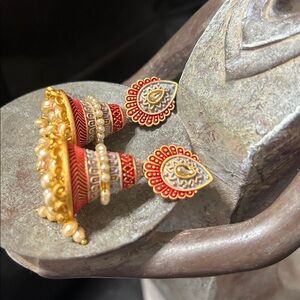 Orange gray jhumkas earings with pearls.
